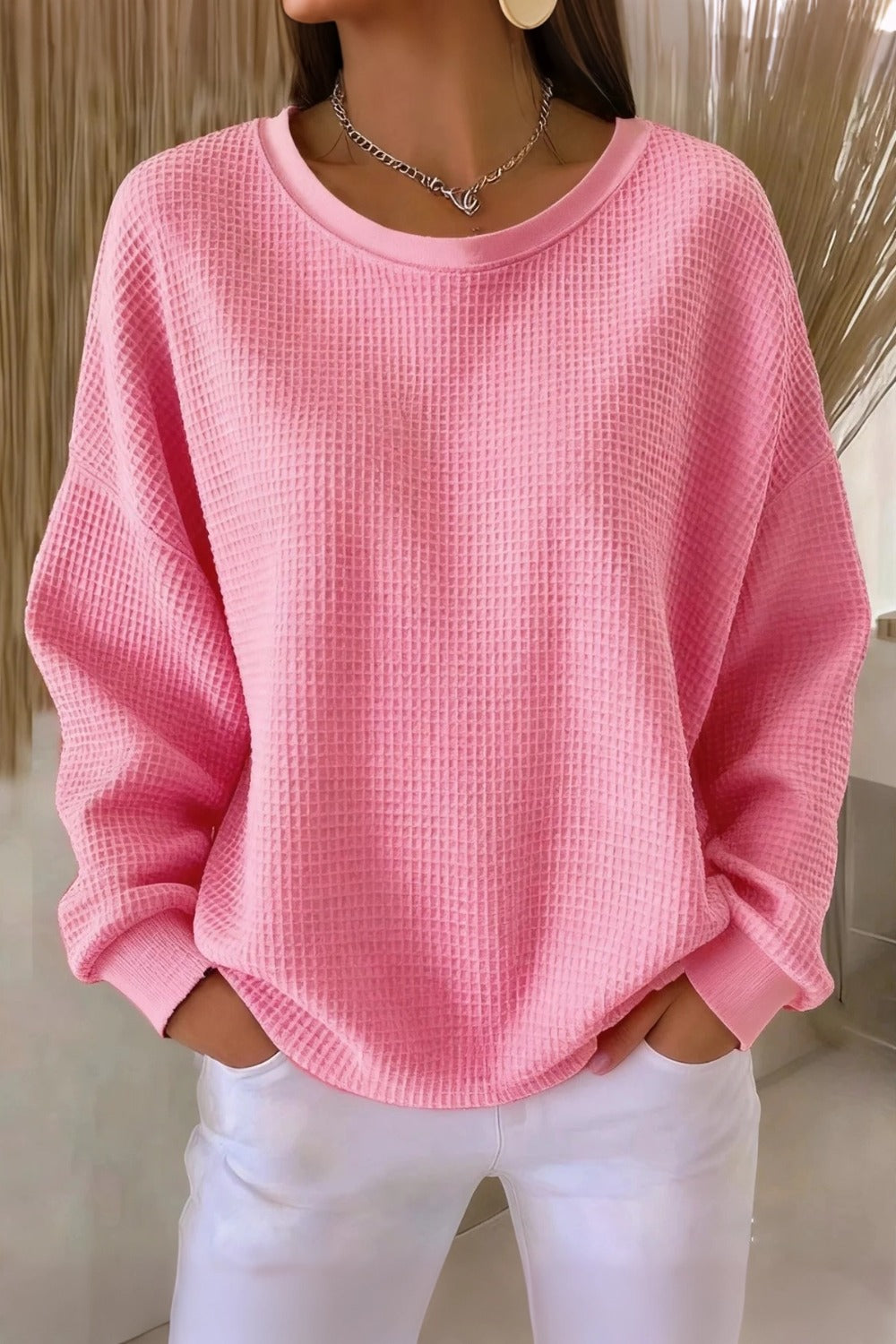Women's plain crew neck waffle-textured sweatshirt in a relaxed casual fit