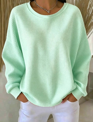 Women's plain crew neck waffle-textured sweatshirt in a relaxed casual fit