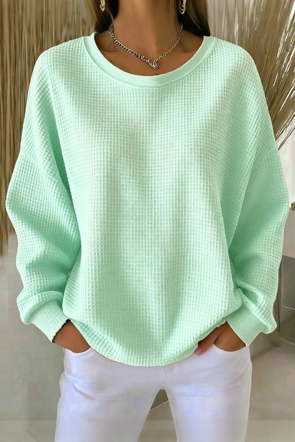 Women's plain crew neck waffle-textured sweatshirt in a relaxed casual fit