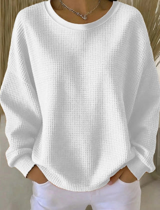 Women's plain crew neck waffle-textured sweatshirt in a relaxed casual fit