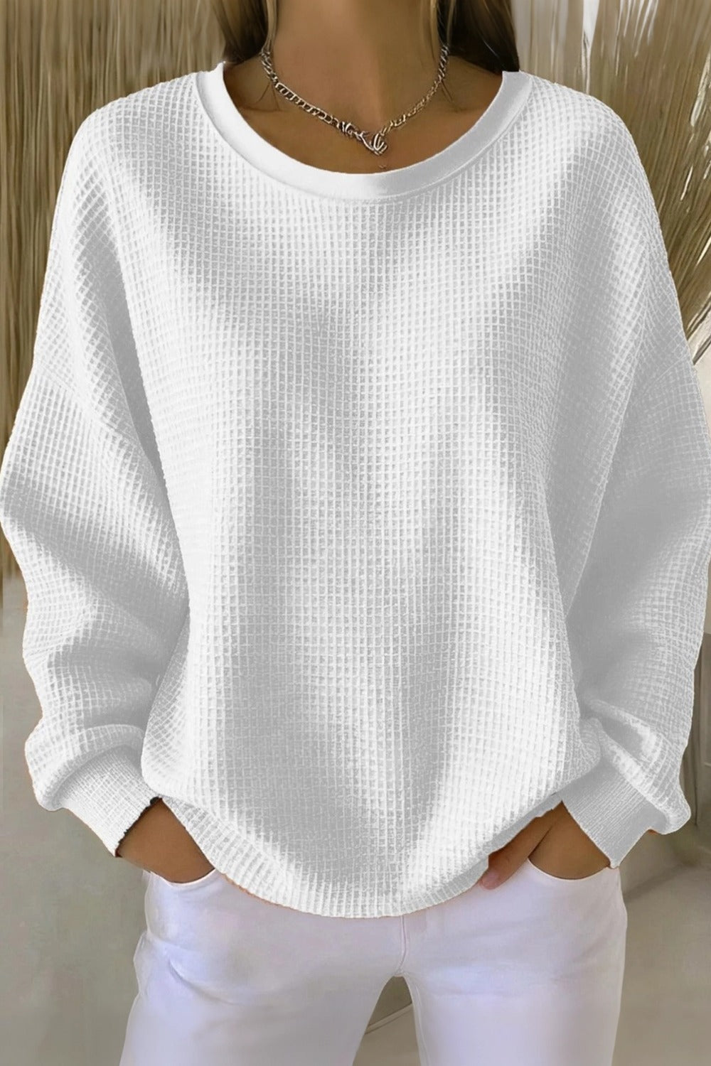Women's plain crew neck waffle-textured sweatshirt in a relaxed casual fit
