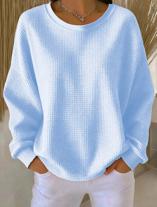 Women's plain crew neck waffle-textured sweatshirt in a relaxed casual fit