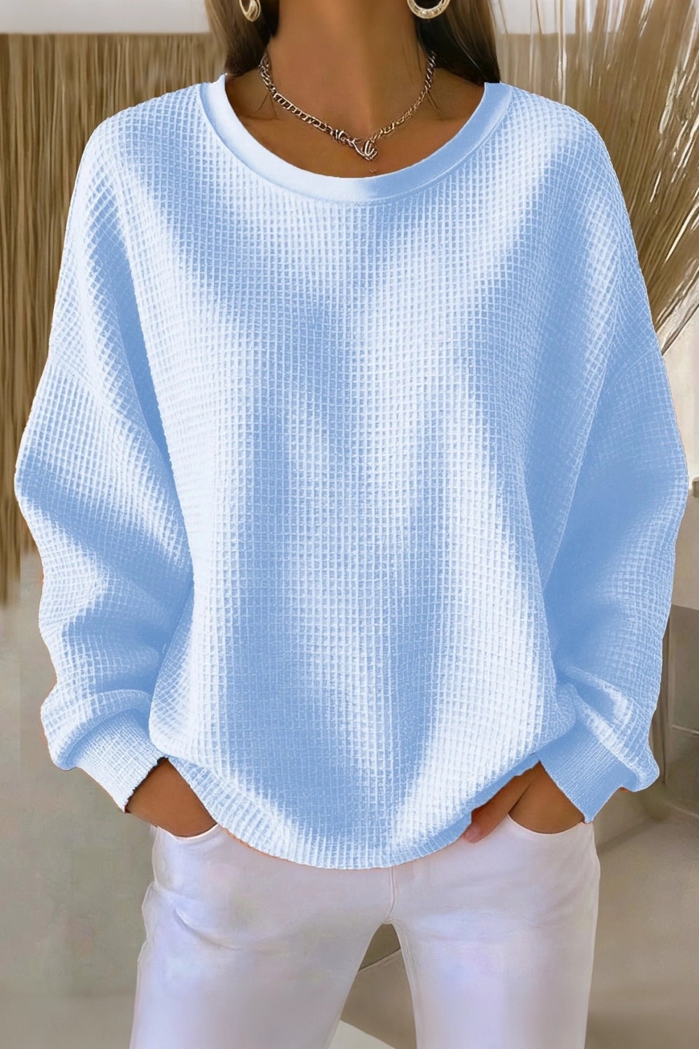 Women's plain crew neck waffle-textured sweatshirt in a relaxed casual fit