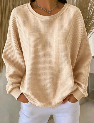 Women's plain crew neck waffle-textured sweatshirt in a relaxed casual fit