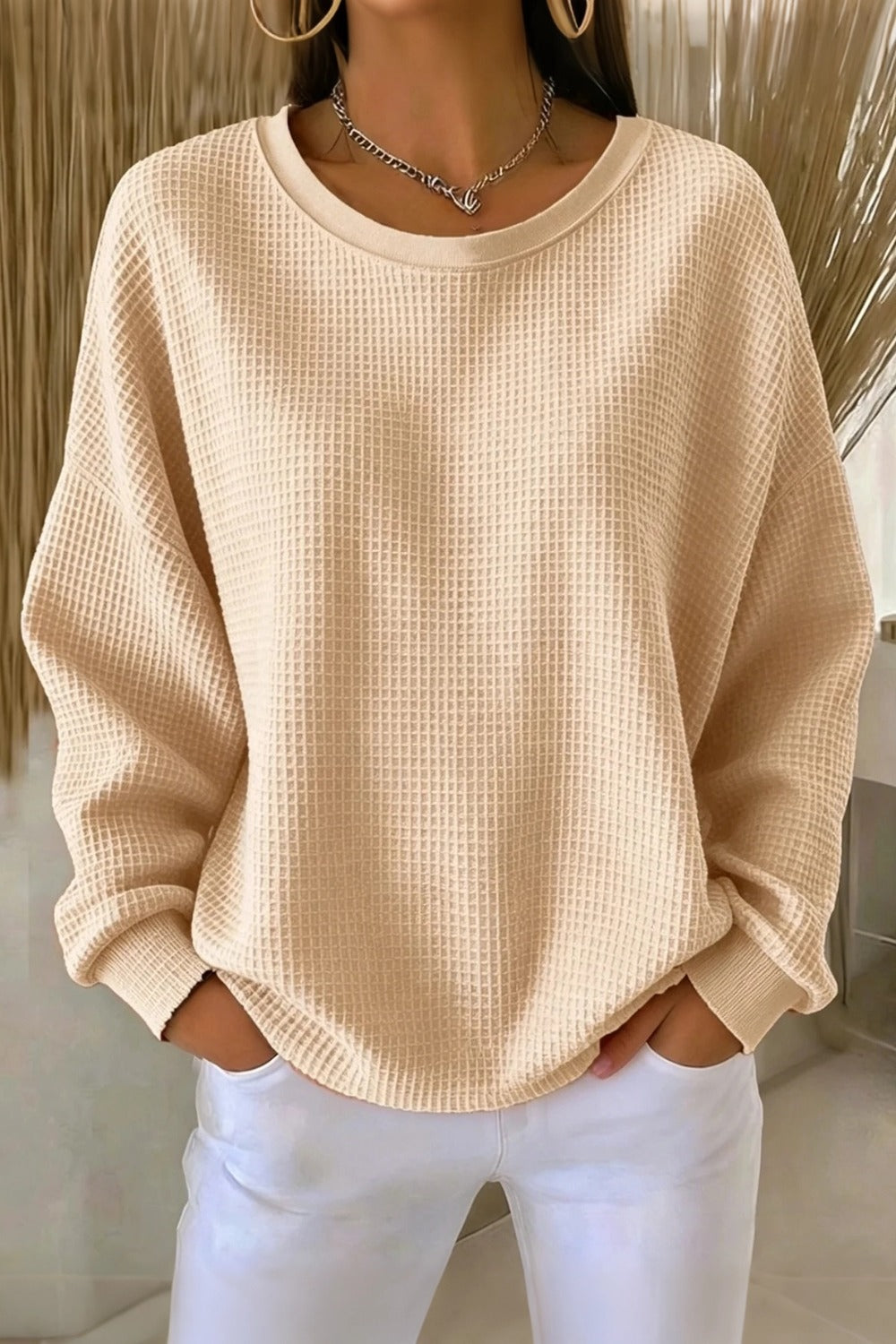 Women's plain crew neck waffle-textured sweatshirt in a relaxed casual fit