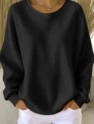 Women's plain crew neck waffle-textured sweatshirt in a relaxed casual fit