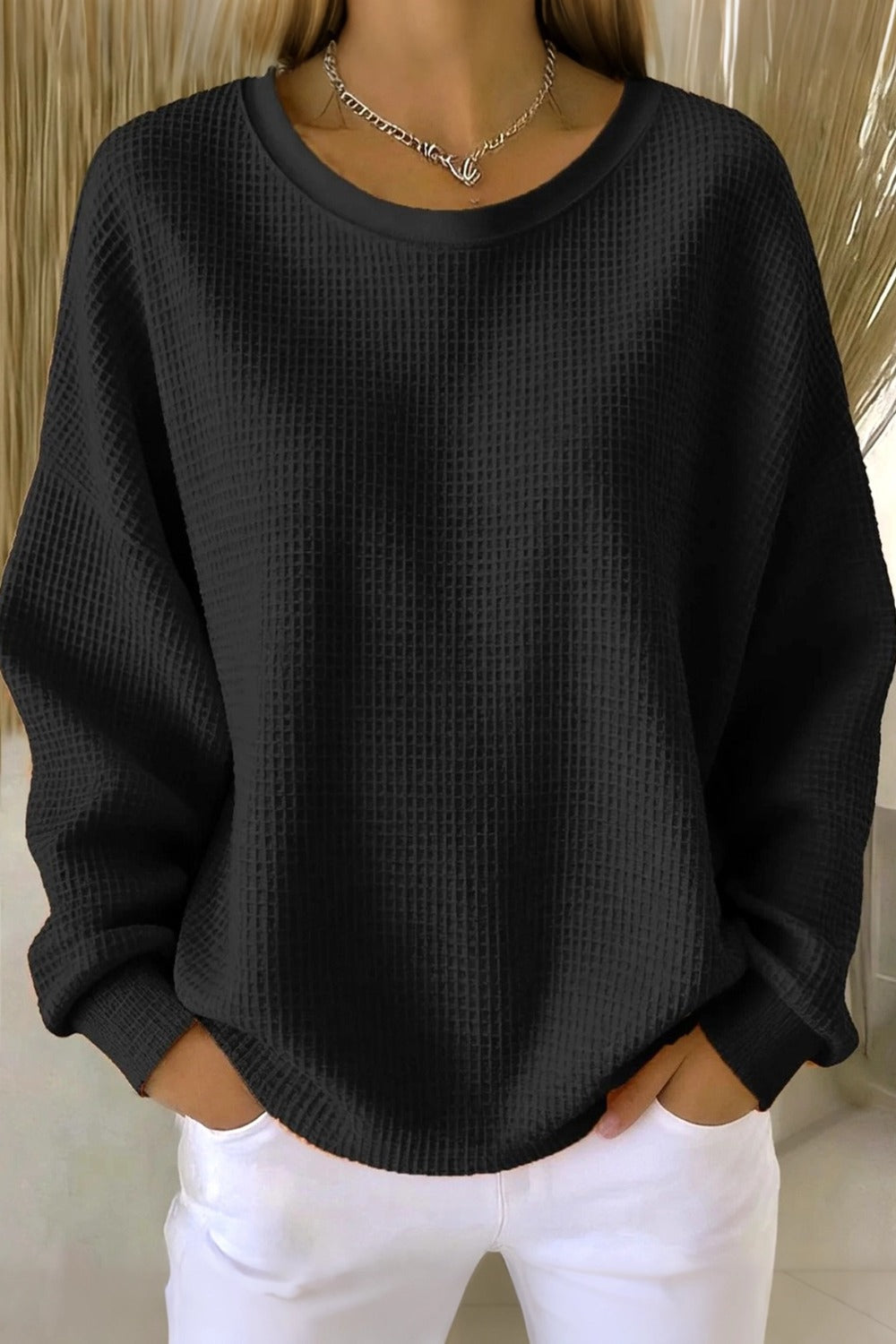 Women's plain crew neck waffle-textured sweatshirt in a relaxed casual fit