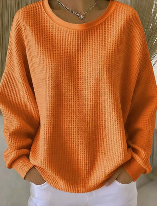 Women's plain crew neck waffle-textured sweatshirt in a relaxed casual fit