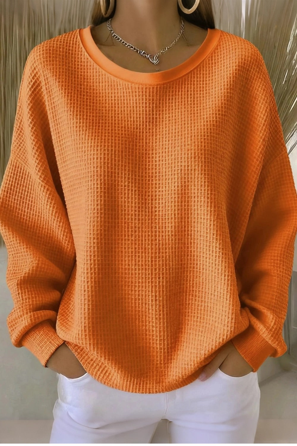 Women's plain crew neck waffle-textured sweatshirt in a relaxed casual fit