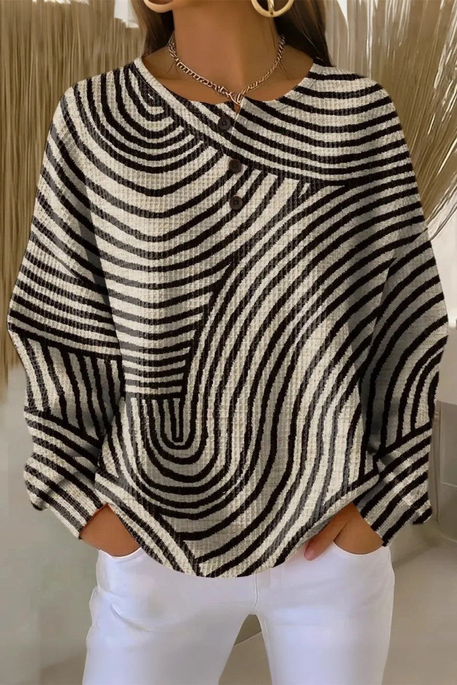 Women's crew neck waffle sweatshirt with abstract print in a relaxed fit