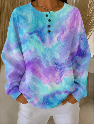 Women's henley collar ombre sweatshirt with buttoned neckline and relaxed fit