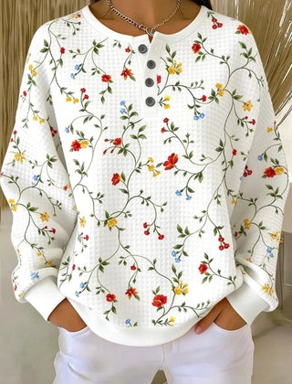 Womens floral print waffle-knit sweatshirt in a relaxed loose fit