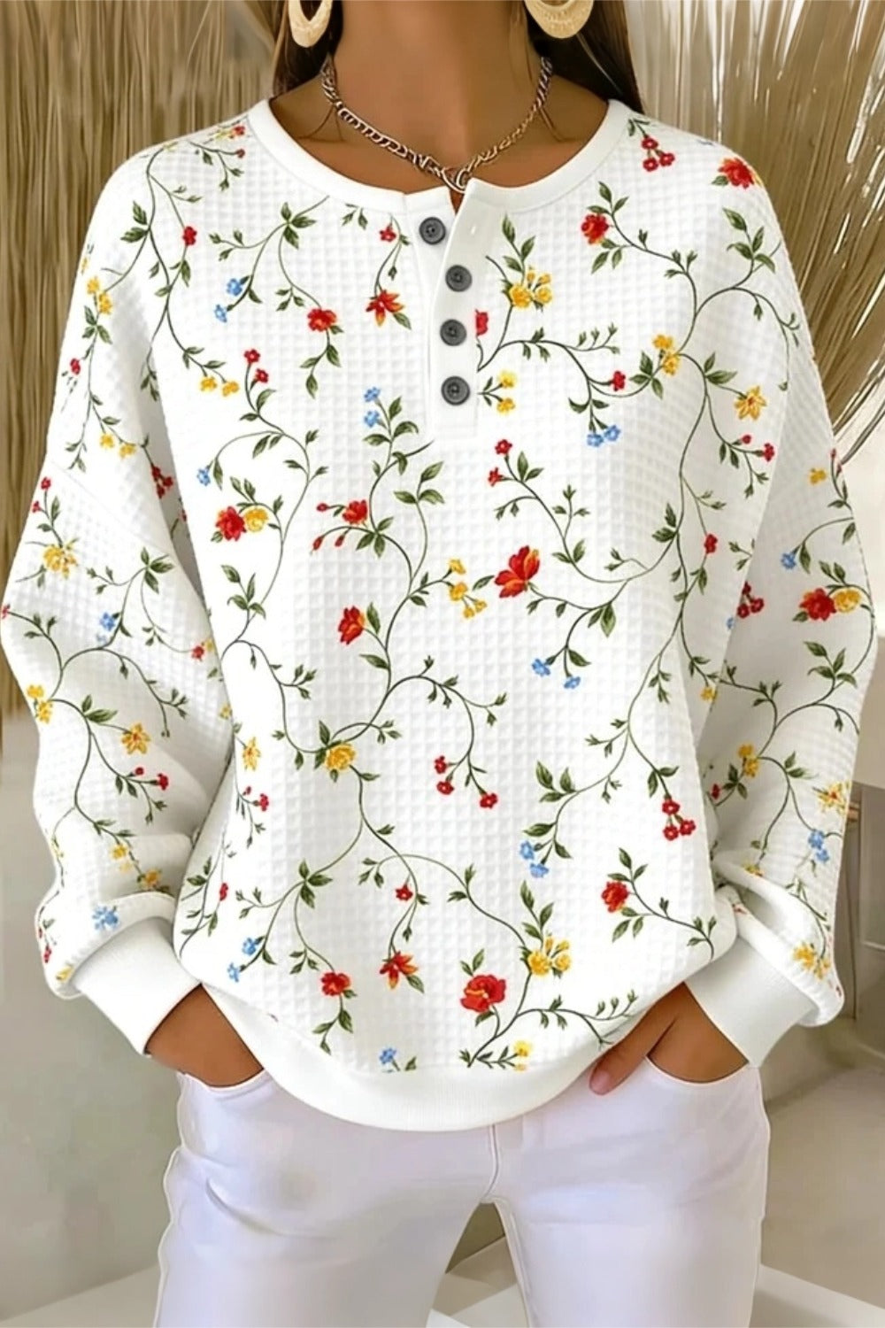 Womens floral print waffle-knit sweatshirt in a relaxed loose fit