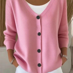 Woman wearing a plain long sleeve loose-fit V-neck casual cardigan