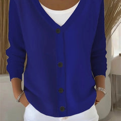 Woman wearing a plain long sleeve loose-fit V-neck casual cardigan