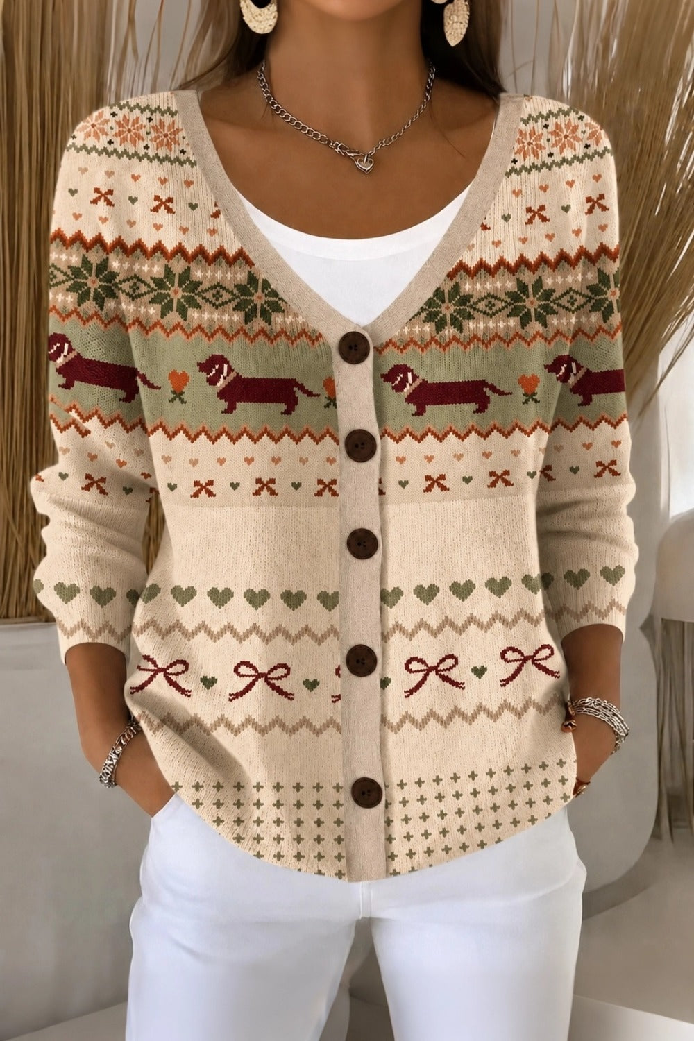 Women's loose-fit knit cardigan with playful dog motif and V-neckline