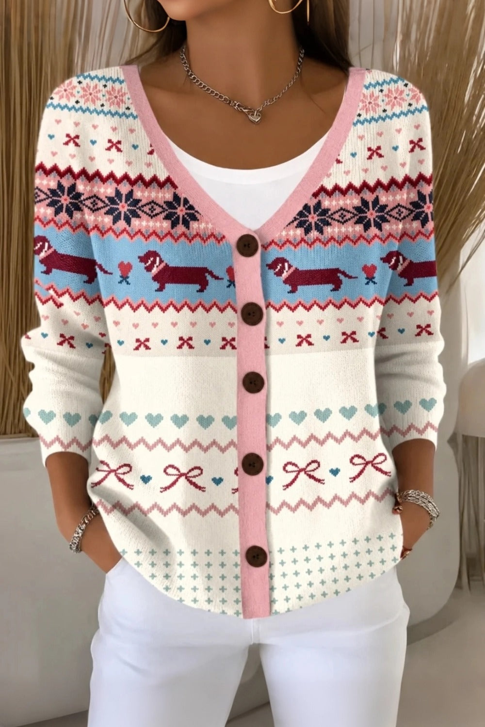 Women's loose-fit knit cardigan with playful dog motif and V-neckline