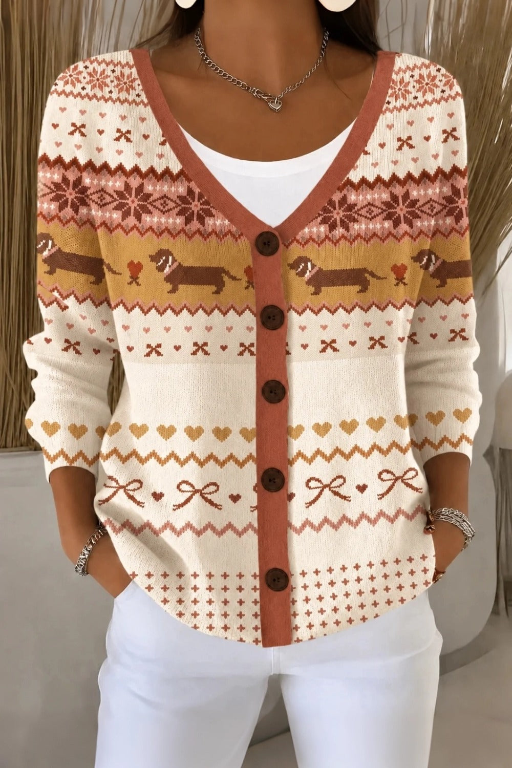 Women's loose-fit knit cardigan with playful dog motif and V-neckline