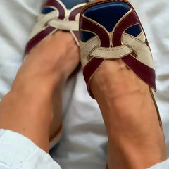 Tri-color woven slip-on flats in burgundy and blue with intricate weaving detail