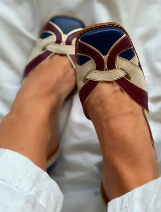 Tri-color woven slip-on flats in burgundy and blue with intricate weaving detail
