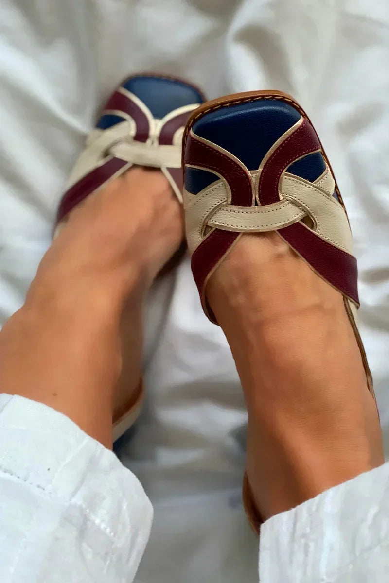Tri-color woven slip-on flats in burgundy and blue with intricate weaving detail