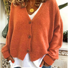 Women's V-neck button-front knit cardigan with long sleeves in a relaxed, slightly cropped fit