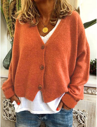 Women's V-neck button-front knit cardigan with long sleeves in a relaxed, slightly cropped fit