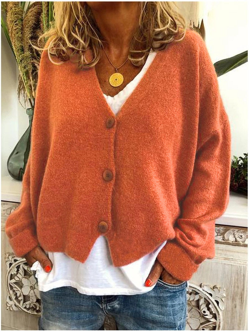 Women's V-neck button-front knit cardigan with long sleeves in a relaxed, slightly cropped fit