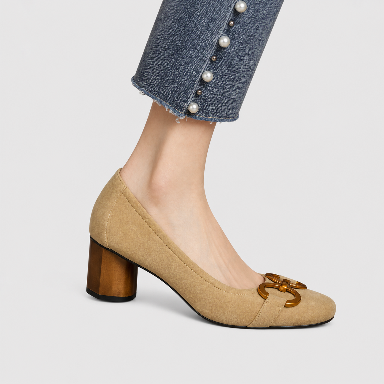 Elegant slip-on loafers shown in navy and khaki with refined detailing