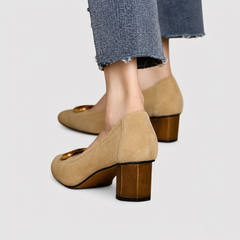 Elegant slip-on loafers shown in navy and khaki with refined detailing