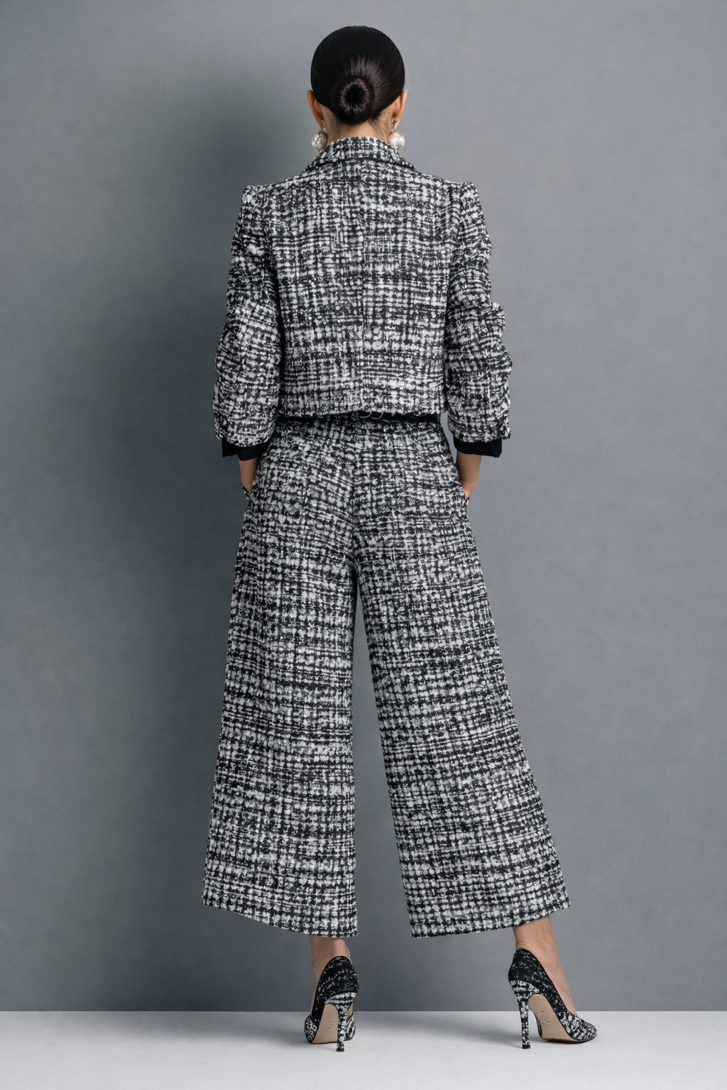 Tweed two-piece set with cropped jacket and high-waisted wide-leg trousers