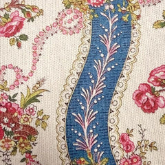 Ivory zip cardigan with pink climbing roses, blue ribbon bands and gold scrollwork detailing