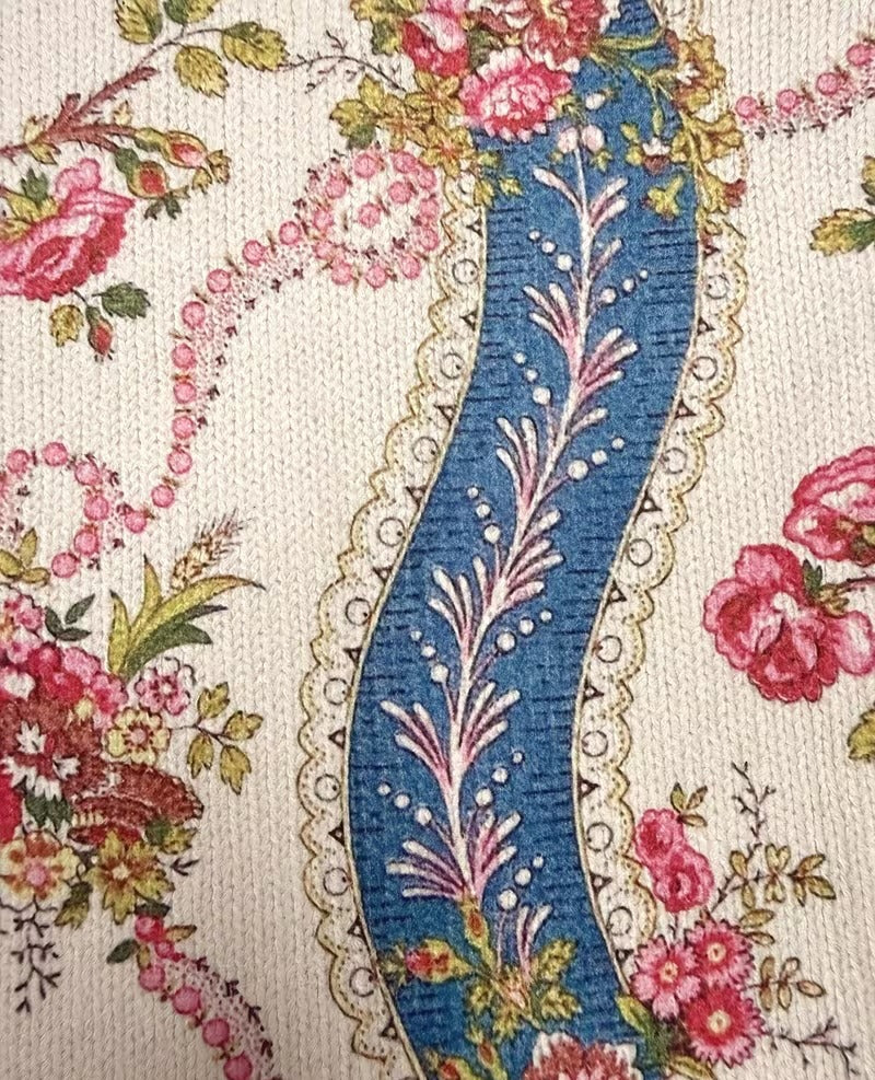 Ivory zip cardigan with pink climbing roses, blue ribbon bands and gold scrollwork detailing
