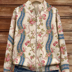 Ivory zip cardigan with pink climbing roses, blue ribbon bands and gold scrollwork detailing