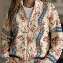 Ivory zip cardigan with pink climbing roses, blue ribbon bands and gold scrollwork detailing