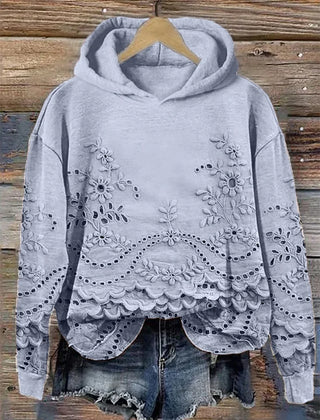 Women's floral eyelet pullover hoodie with structured hood and scalloped hem
