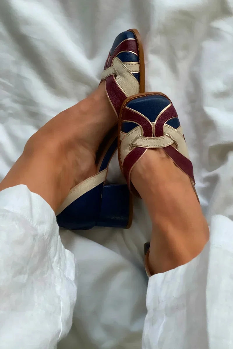 Tri-color woven slip-on flats in burgundy and blue with intricate weaving detail