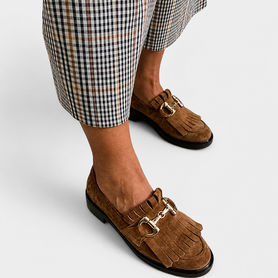 Brown round-toe women's loafers with refined stitching and a structured finish