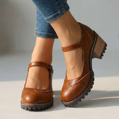 Marie T-strap Mary Jane heels with buckle closure, shown in black, brown and khaki