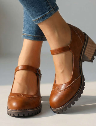 Marie T-strap Mary Jane heels with buckle closure, shown in black, brown and khaki