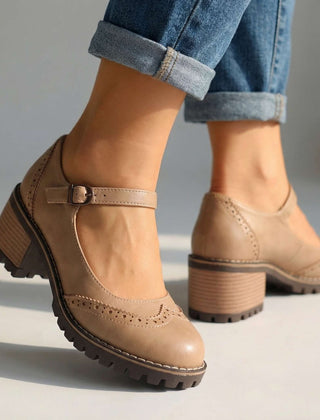 Marie T-strap Mary Jane heels with buckle closure, shown in black, brown and khaki