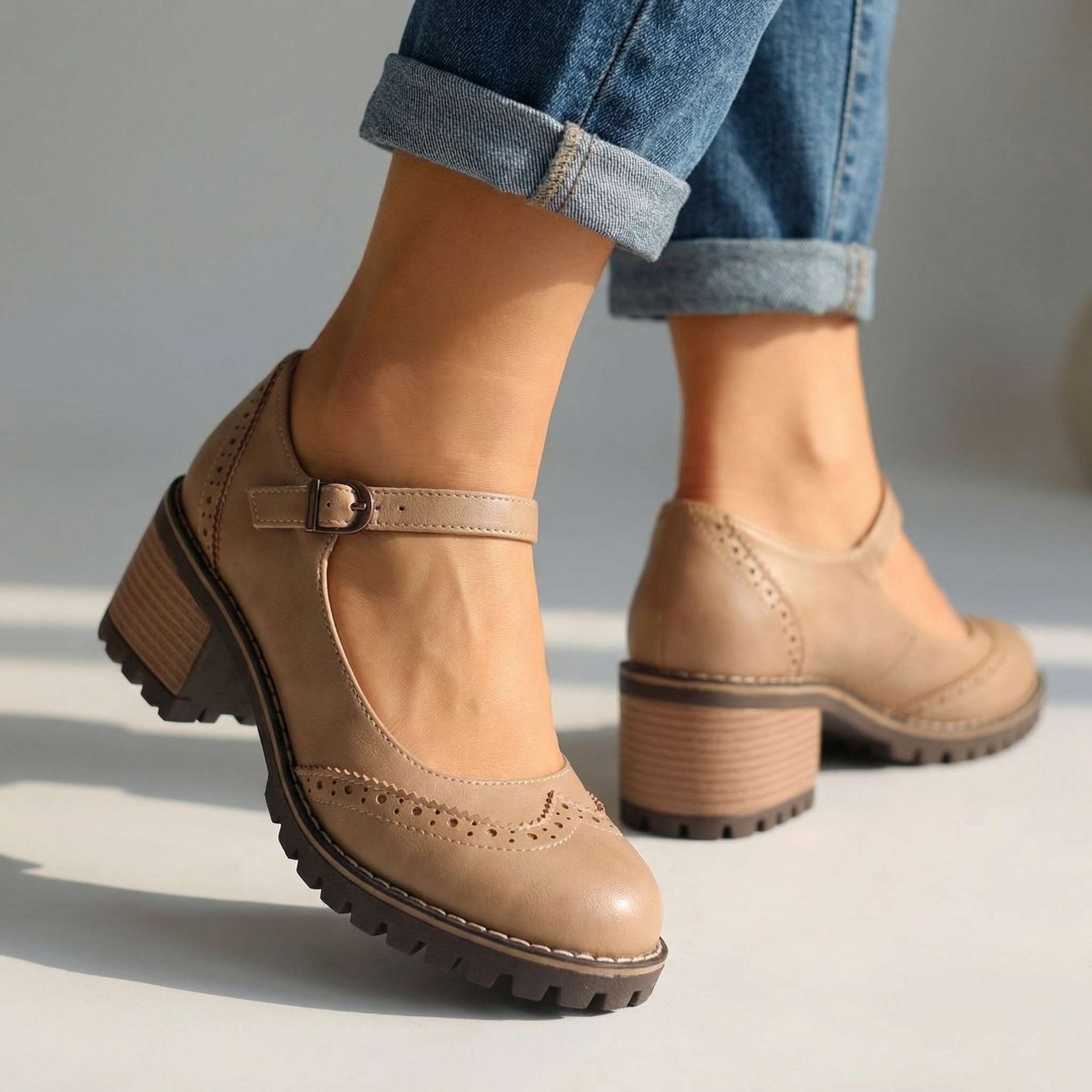 Marie T-strap Mary Jane heels with buckle closure, shown in black, brown and khaki