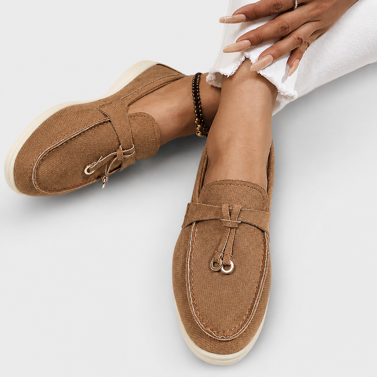 Elegant slip-on loafers shown in several neutral and colour options