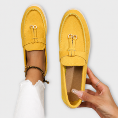 Elegant slip-on loafers shown in several neutral and colour options