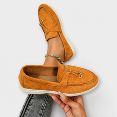 Elegant slip-on loafers shown in several neutral and colour options