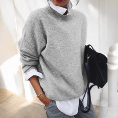 Women's solid single-tone round neck pullover sweater with long sleeves and straight hem