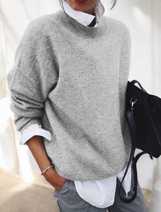 Women's solid single-tone round neck pullover sweater with long sleeves and straight hem