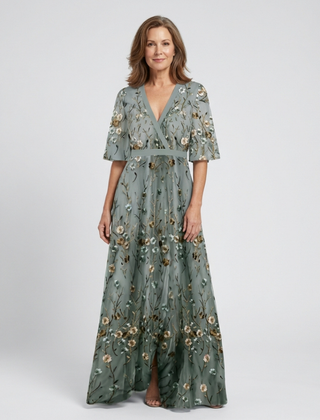 Green V-neck maxi dress with flowing floor-length skirt