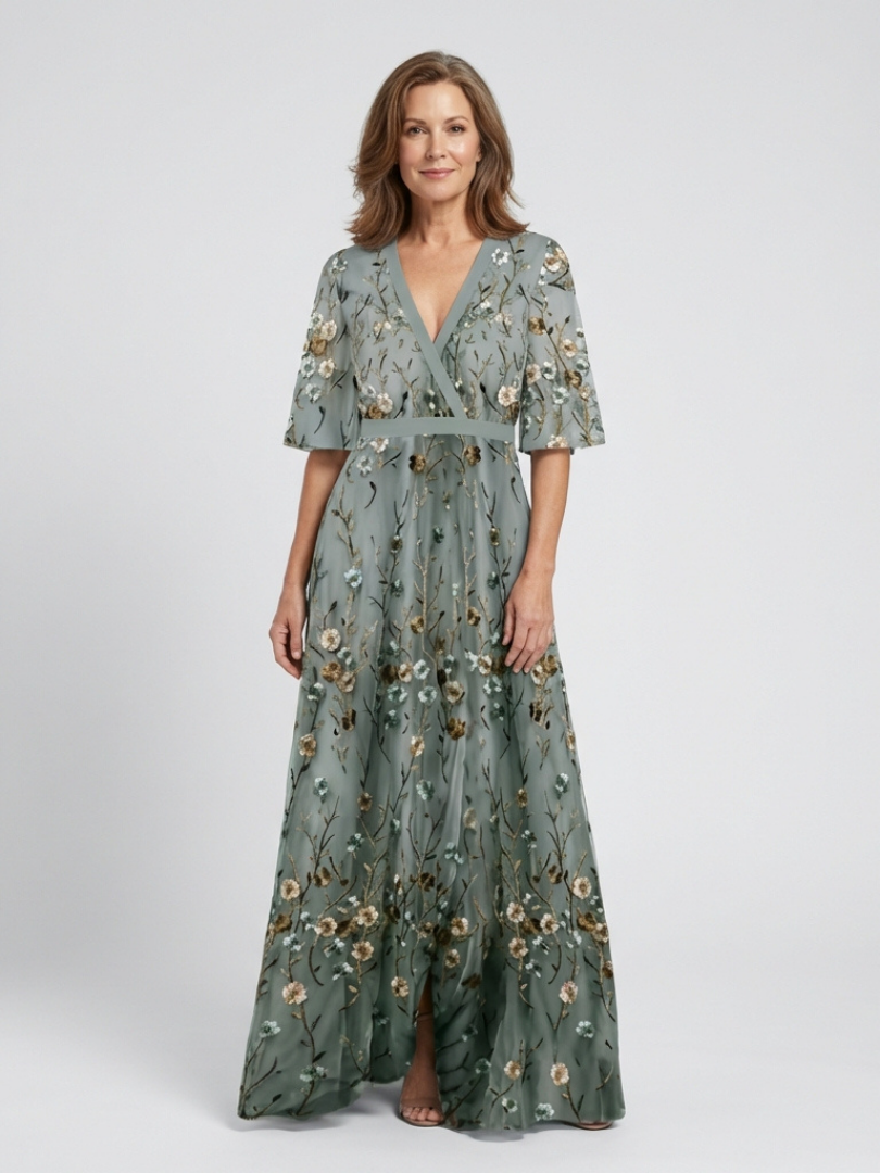 Green V-neck maxi dress with flowing floor-length skirt