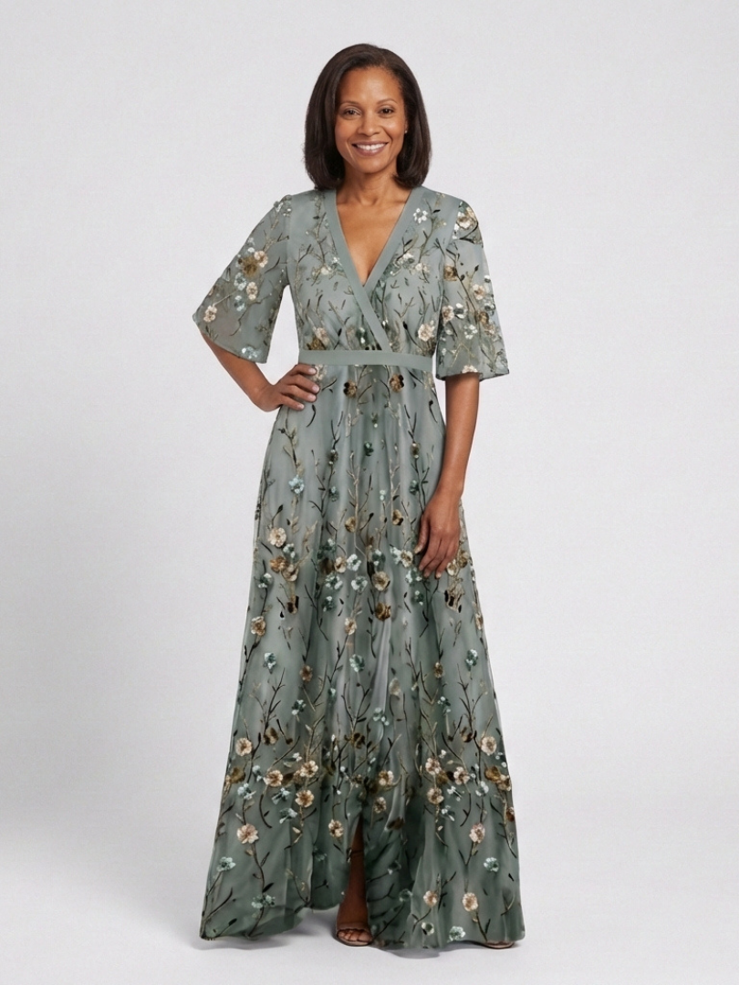Green V-neck maxi dress with flowing floor-length skirt